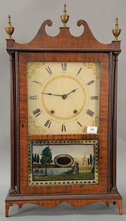 Federal mahogany and maple pillar and scroll clock having brass works. ht. 31", wd. 16 1/2".