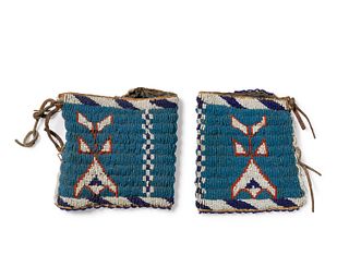 A pair of Sioux beaded hide gauntlets