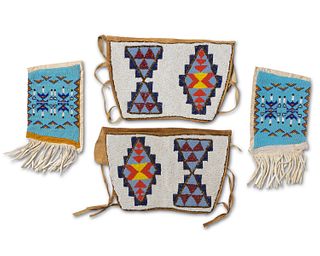 Two pairs of Plateau-style beaded items