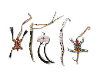 A group of Plains-style beaded fetish animals