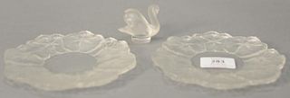 Three Lalique frosted crystal pieces including two flower plates (dia. 6") and a small swan (ht. 2").