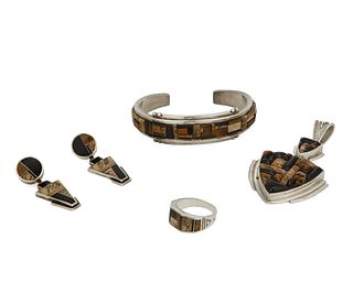 A group of Southwest stone and silver inlay jewelry