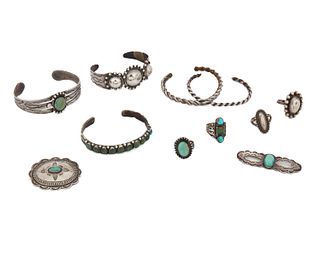 A group of Southwest style silver and turquoise jewelry