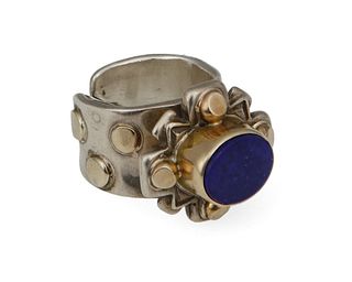 A sterling silver and gold lapis ring