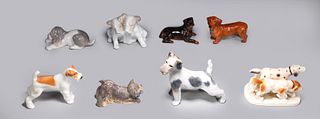 Group of Eight Porcelain Dog Figure Collectibles