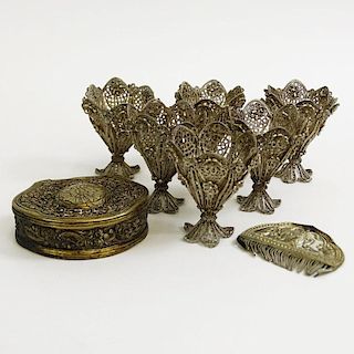 Miscellaneous Lot of 19/20th Century Turkish Silver. Includes 8 filigree cup holders, a small chased box containing a comb.