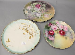 Three large Limoges hand painted trays, two with roses and one with gold leaf and berries. lg. 12 1/2" & 16"; dia. 15".