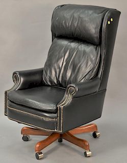 Leather swivel office chair. ht. 45"