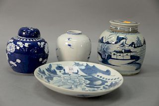 Four pieces of Chinese blue and white and Canton to include three ginger jars and a phoenix plate.