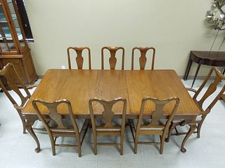 Lineage Oak Dining Table with 8 Chairs.