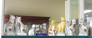 Group of (9) Staffordshire Pottery Cat Figures.