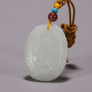 An inscribed figure patterned jade pendant