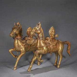 A pair of copper horses