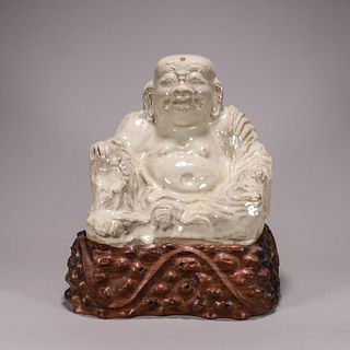 A Yixing clay buddha statue