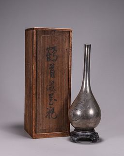 A silver plum blossom vase