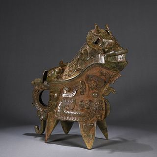 A kui dragon patterned bronze goat head pot