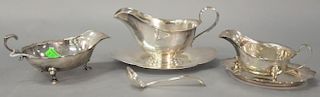 Three sterling silver gravy boats with under dish and ladle, 23.1 t oz.
