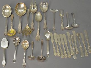 Large group of sterling silver flatware serving pieces, butter knives, etc. 33.6 t oz.