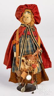 Early peg wooden peddler doll, 19th c.