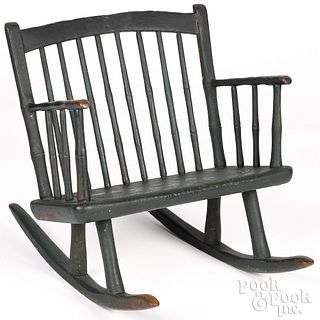 Pennsylvania walnut child's rocking Windsor chair