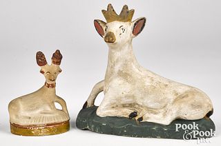 Two Pennsylvania painted chalkware recumbent stags