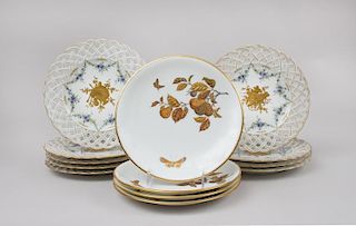 Set of Nine Sèvres Style Porcelain Dessert Plates with Gilt Garden Trophies and Reticulated Borders