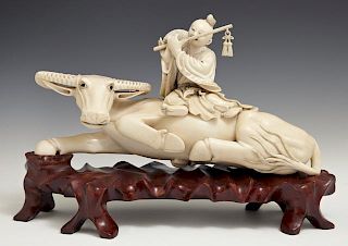 Chinese Carved Ivory Figure, mid 20th c., of a fla