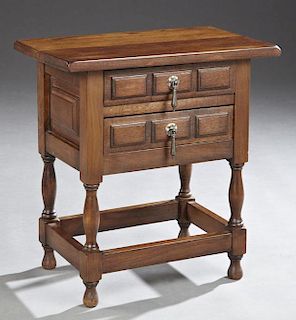 Spanish Style Oak Nightstand, 20th c., the rounded