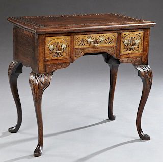 Carved Oak Queen Anne Style Lowboy, 20th c., with
