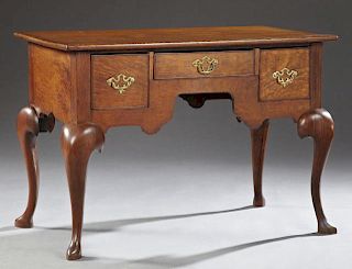 English Carved Oak Desk, early 20th c., the rectan