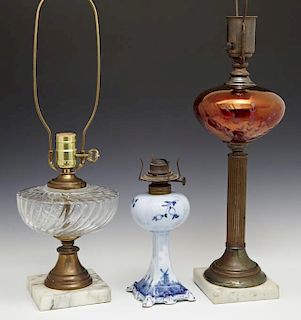 Group of Three Oil Lamps, 19th c., consisting of a