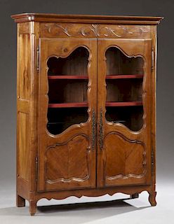 French Louis XV Style Carved Cherry Bookcase, late