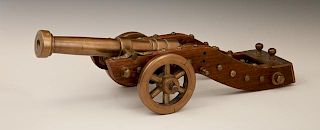 Unusual Bronze and Oak Cannon, early 20th c., on a