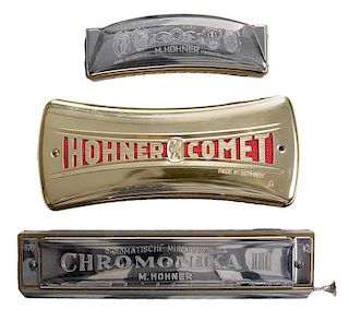 Three Hohner Harmonicas
