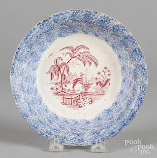 Blue spatter shallow bowl with red transfer decoration, 7 1/4'' dia.