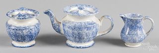 Three-piece blue spatter tea service, teapot - 3 1/2'' h.