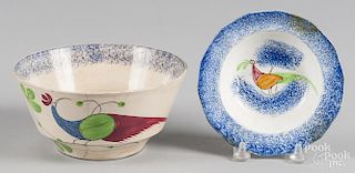 Two blue spatter bowls with peafowl decoration, 1'' h., 5 1/4'' dia. and 3'' h., 6 1/4'' dia.