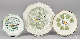 Three English pearlware plates, 19th c., with peafowl decoration, 7'' dia., 8'' dia., and 10'' dia.