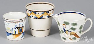 Two English pearlware beakers, together with a creamer, tallest - 3 3/8''.