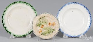 Two pearlware feather edge toddy plates, 19th c., 4 3/8'' dia., together with a cup plate