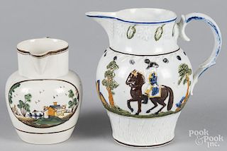 Two pearlware pitchers, 19th c., with polychrome decoration, 4 1/2'' h. and 6 1/8'' h.