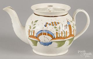 Pearlware punch pot, 19th c., with polychrome decoration, 6 1/4'' h.