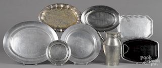 Seven reproduction pewter and silver-plate platters, together with a watering can, 11'' h.