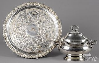 Silver-plated tureen, 12'' l., 15 1/2'' w., and platter, 22'' dia.