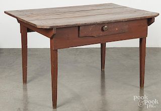 Painted pine tavern table, 19th c., retaining an old red surface, 30'' h., 50'' w., 36'' d.