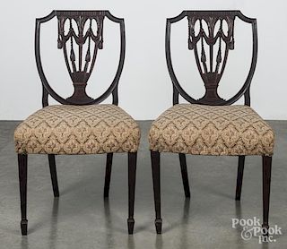 Pair of Federal style carved mahogany shieldback dining chairs, ca. 1900.