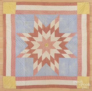 Pieced lone star crib quilt, early 20th c., 41'' x 41''.