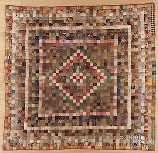 Pieced postage stamp diamond in square quilt, late 19th c., 86'' x 82''.