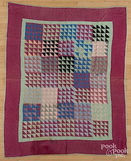 Flying geese variant quilt, early 20th c., 67'' x 55''.