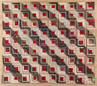 Pieced log cabin quilt, late 19th c., 75'' x 68''.